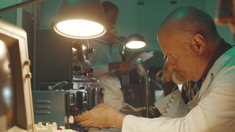 Vintage sci-fi scientists working in a operation room