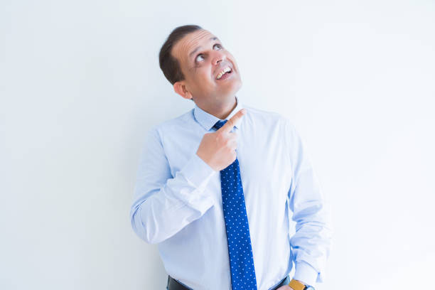 Frustrated young business man hunging himself on his tie