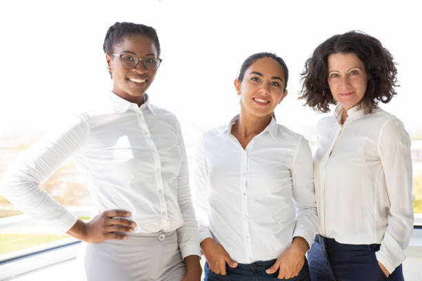 istock Happy female business team posing together 1175449385