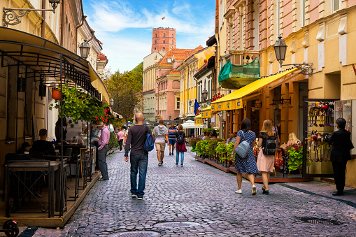 Vilnius, Lithuania - September 29, 2019:Pilies Street in the old town of Vilnius, which is popular place of walks and tourist route with scenic city views, numerous attractions, cafes, souvenir shops