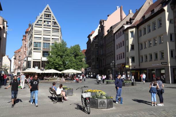 People in Nuremberg People visit Ludwigsplatz (Ludwig Square) shopping area in Nuremberg Old Town, Germany. karolinenstrasse stock pictures, royalty-free photos & images