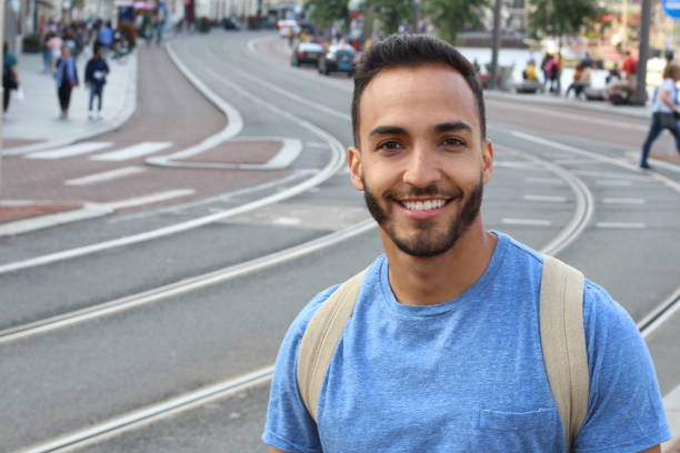 istock Charming ethnic man in the city 1175461297