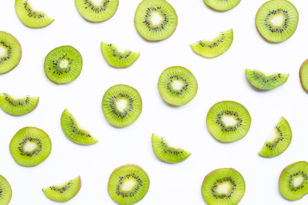istock Kiwi fruit slices isolated on white. 1175466485