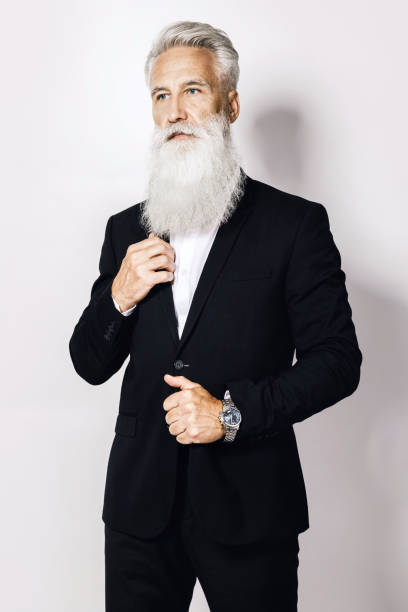 istock Handsome aged man wearing stylish black suit 1175471354