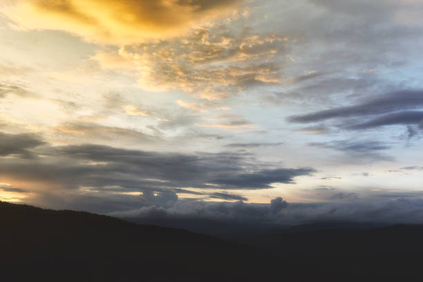 istock Sunset landscape beautiful with orange sky cloud in the mountain with tree foreground - sunset mountains forest fog mist in Asia 1175471624
