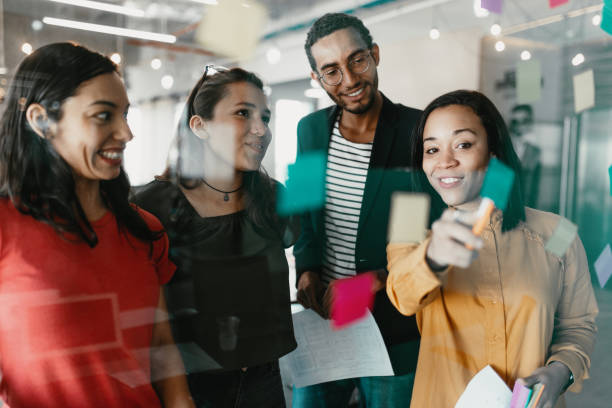 istock Brainstorming in modern business hub 1175472969