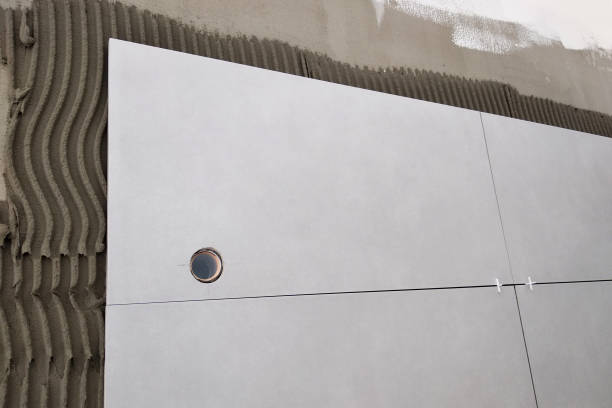 istock Wall ceramic tiles installation on mortar glue. 1175474414
