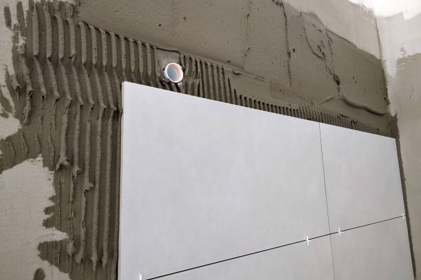 istock Wall ceramic tiles installation on mortar glue. 1175474462