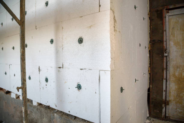 istock Insulation work of house walls with styrofoam sheets. 1175475688