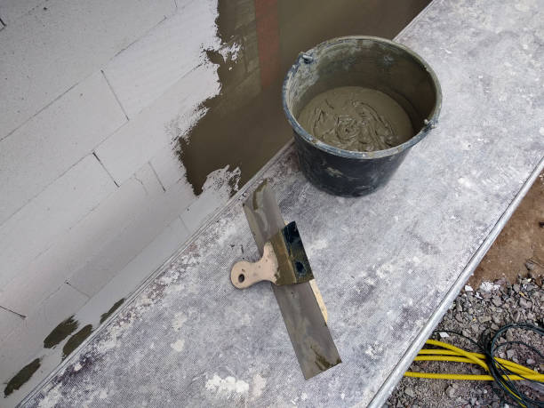 istock Tools and material foe covering walls with protective adhesive before finish paint. 1175475770