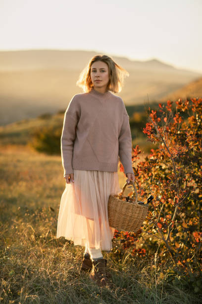istock Woman wearing warm clothes walking outdoor. 1175475998