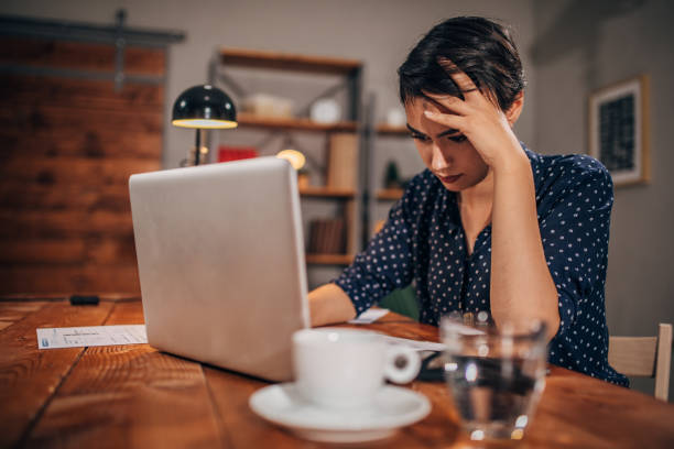 istock Lady working on laptop in office 1175477505