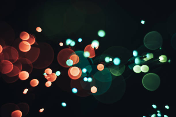 istock Beautiful abstract optical light bokeh on a glow background. 1175481204