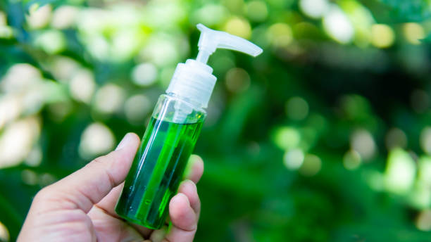 istock Hand holding bottle in the nature 1175481307