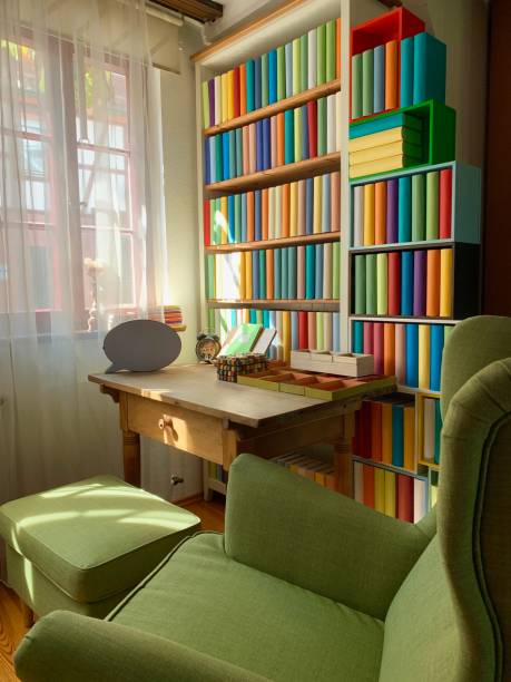 istock Desk and book shelves including generic books 1175492352