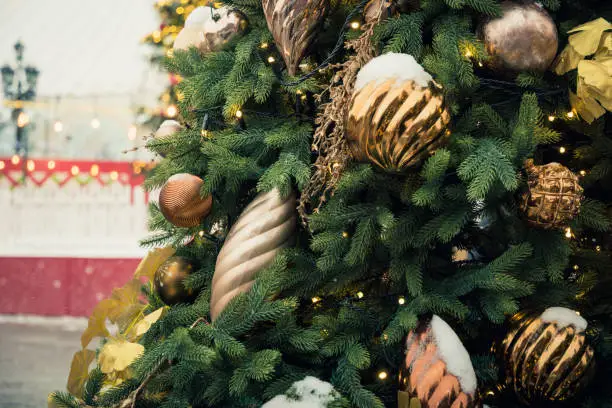 Photo of Christmas tree and carousel on Red square. Christmas celebration and fairy. New year. Decorated city.