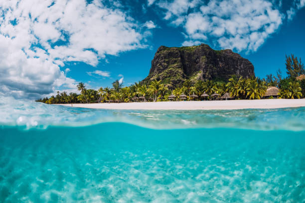 istock Tropical crystal ocean with Le Morne mountain and luxury beach in Mauritius. Split view. 1175496293