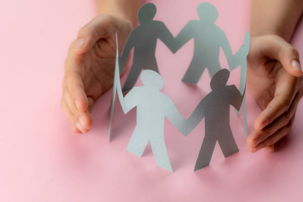 istock Hand Protecting Paper Cut Out Figure 1175497358