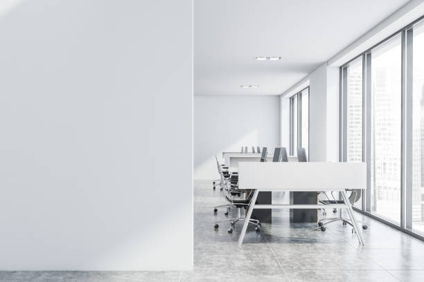 istock Stylish white loft office with mock up wall 1175499498