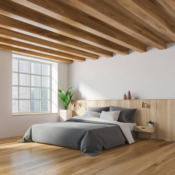 istock Stylish white and wooden bedroom corner 1175499645