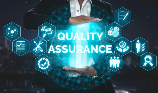 Photo of QA Quality Assurance and Quality Control Concept