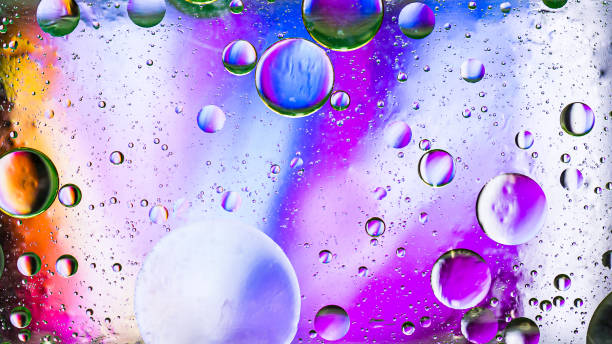 istock Colorful artistic image of oil drop on water 1175503968