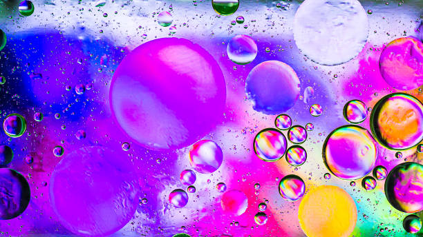 istock Colorful artistic image of oil drop on water 1175504096