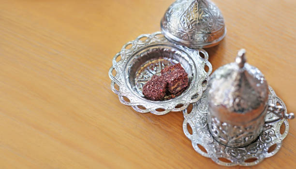 istock traditional turkish coffee and turkish delight on wooden table 1175506324