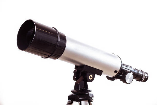 istock telescope on a white background laid on wooden board 1175506440
