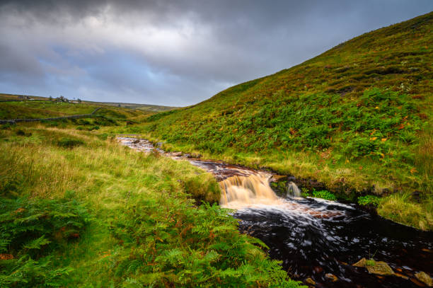 Small Waterfall in River West Allen The River West Allen begins its journey on Coalcleugh Moor in the North Pennines AONB pennines photos stock pictures, royalty-free photos & images