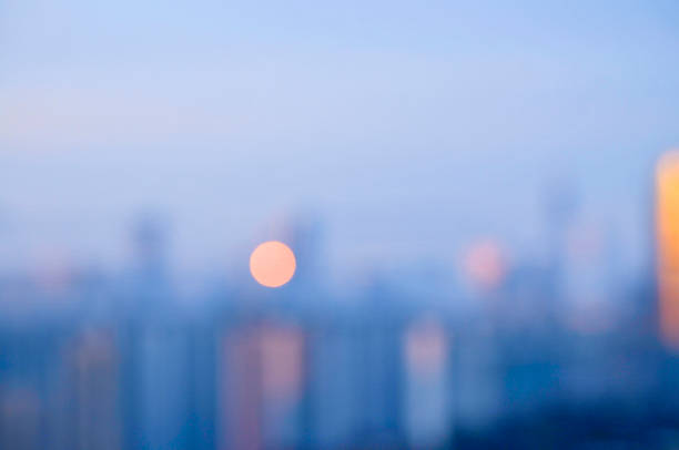 istock Blurred cityscape in a sunny day 1175509874