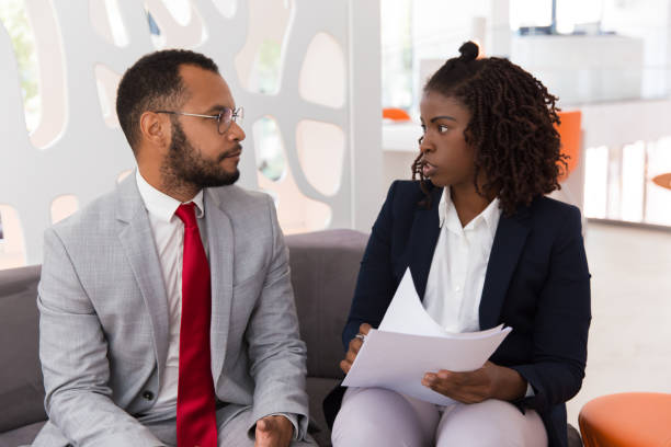 istock Young employee consulting professional 1175510774