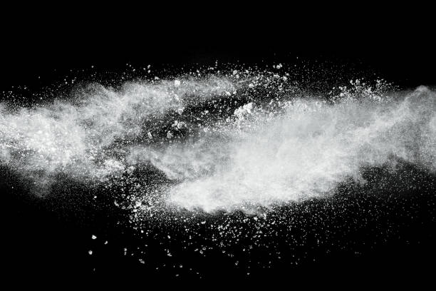 istock White powder explosion cloud against black background.White dust particles splash. 1175512547