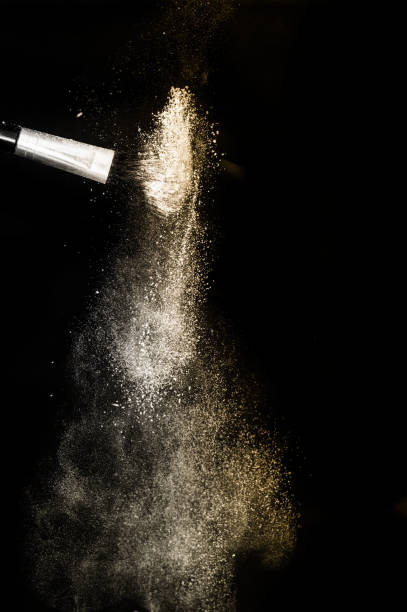 istock golden powder splash and brush 1175512630