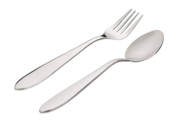 istock Metal fork and spoon isolated on white background 1175512810