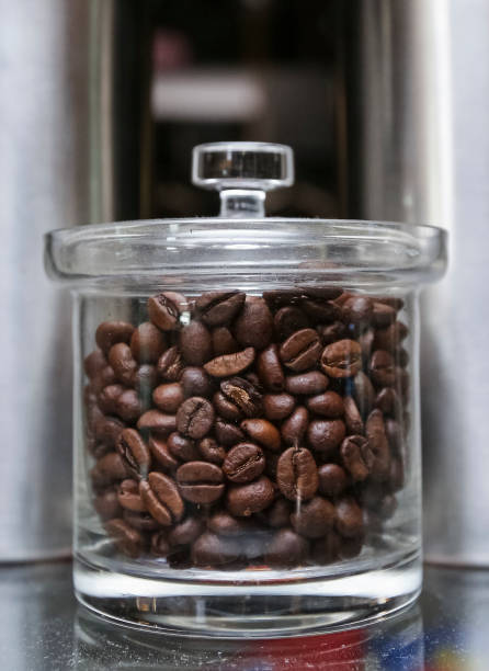 istock Coffee beans in jars 1175515072