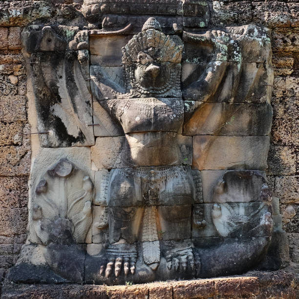 Image of a harpy on an old stone wall. Ancient masonry.
