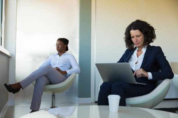 istock Confused frowning businesswoman working on computer 1175520400
