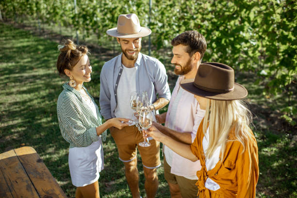 istock Friends tasting wine on the vineyard 1175521468