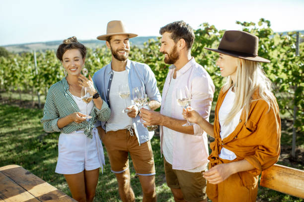 istock Friends tasting wine on the vineyard 1175521480