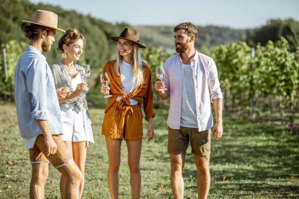 istock Friends tasting wine on the vineyard 1175521562