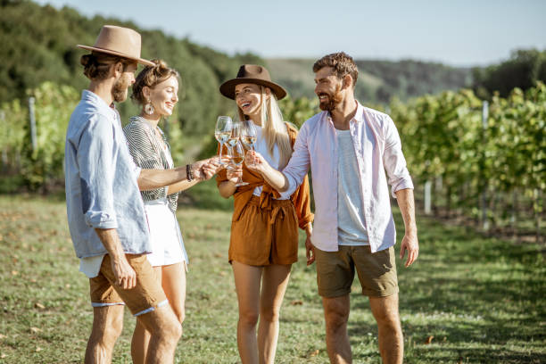 istock Friends tasting wine on the vineyard 1175521583