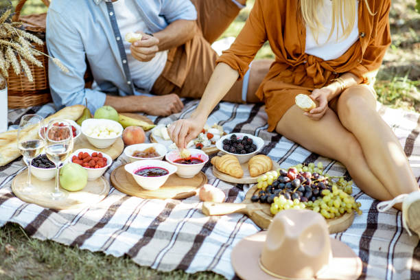 istock Couple having romantic breakfast outdoors 1175521633
