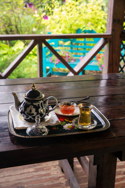 istock Kettle with green tea, a cup of tea 1175521829