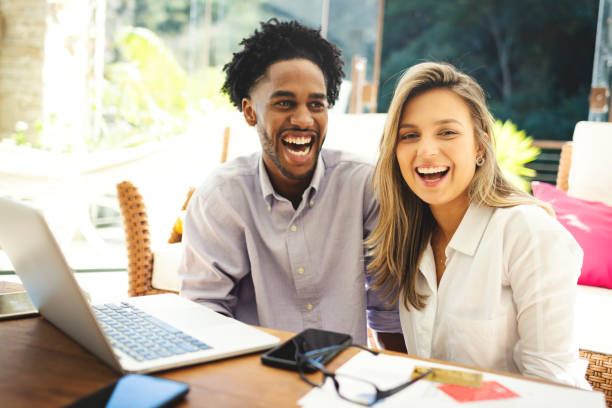 istock Young couple using technology together in the living room 1175523802