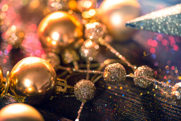 istock Shiny Christmas decorations on glitter background 1175526363