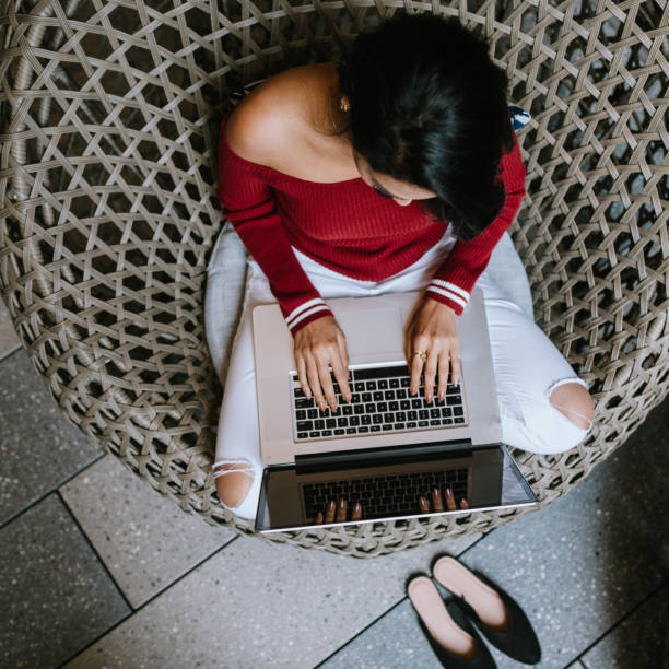 istock Young Indian Woman Working on Laptop Computer 1175527944