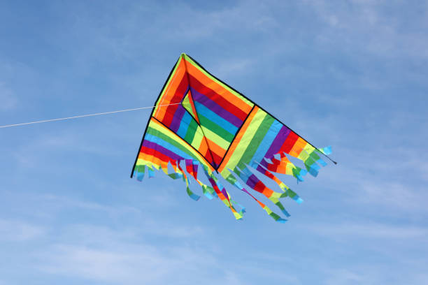 istock very colorful kite flying on the blue sky 1175528066