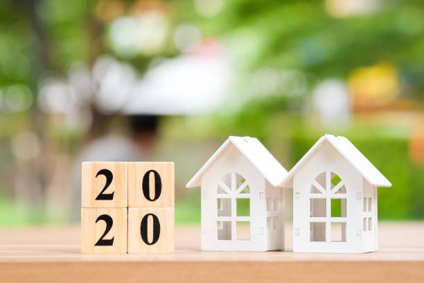 istock 2020 wooden block number with house. 1175528392
