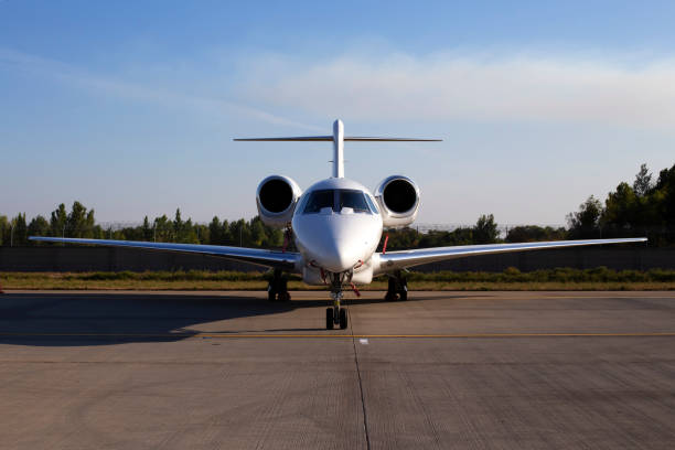 istock White aircraft on the parking zone 1175530018